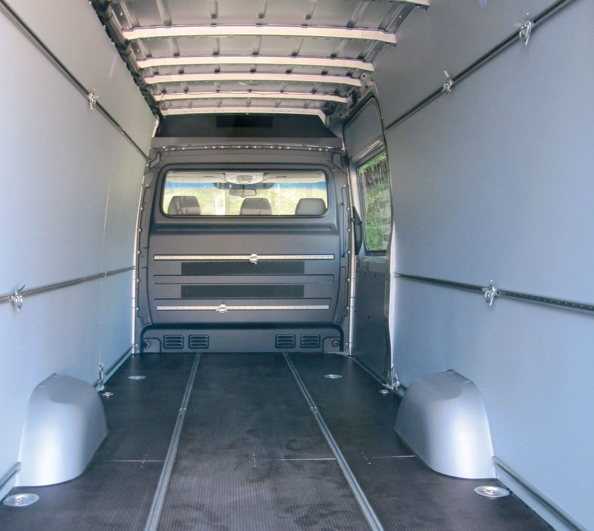 Van cargo area with TAKI® rails on the walls and floor